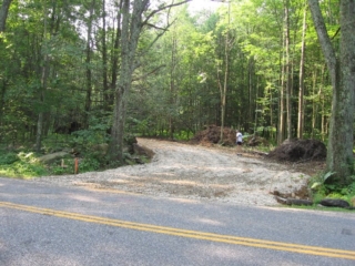 2006/07/26: Don, looking up driveway after driveway constructed and land cleared