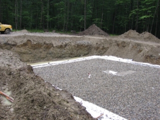 Water seeping from South wall forms ditch