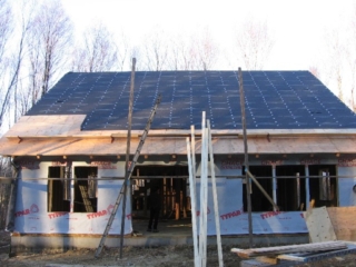 Looking North; South roof almost ready for its shingles