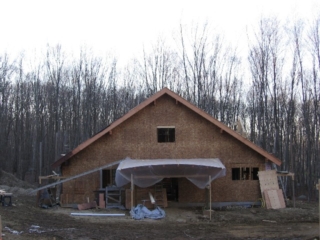 Looking West; roof over pergola; window mock-up; fly rafter stained