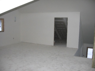 Looking Southeast from the dormer at the loft's storage room