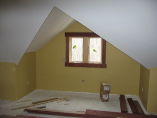Looking North at loft's dormer; loft is painted Chestertown Buff (as is living room, halls, stairways and guest bathroom)