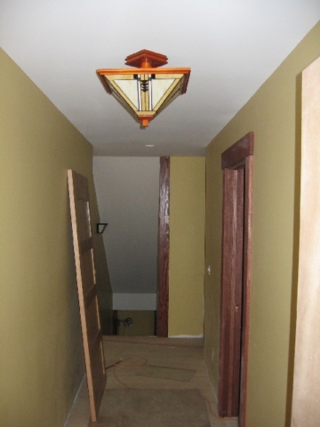 Looking West at front hall light fixture