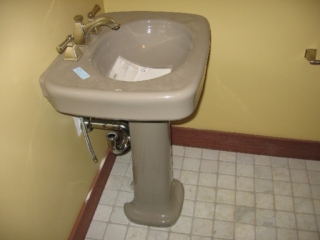 Looking West; guest bath; Kohler Bancroft, Cashmere color sink; Brizo Vesi Curve, brushed nickel faucet; marble floor tile