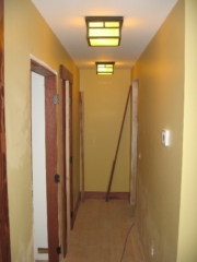Looking North at hallway light fixtures