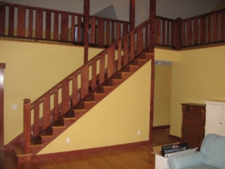 Looking Northeast at stairway to loft