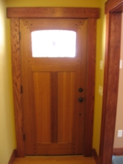 Looking East at the front door from the inside