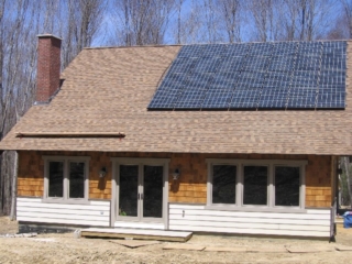 Looking North; in anticipation of Earth Day, 28 Kyocera 200w photovoltaic modules were installed on our solar South-facing, 8-pitch roof yesterday