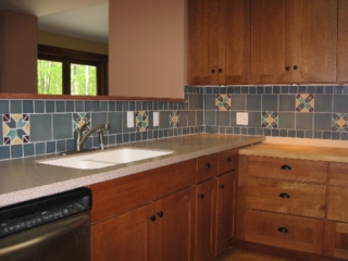 2007/05/13: Looking Southwest; Pratt & Larson backsplash tiles with "star" and "flower" decoratives; Delta faucet