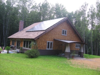 Looking Northwest, 36 days after hydroseeding, plenty of green, and another great solar day!