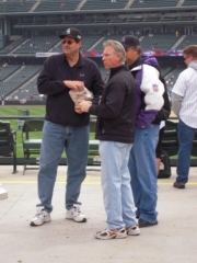 Duv, Mel and Greg getting a head start on the peanuts while hoping for chocolate and ignoring the dangers of a batting practice blast, Friday, 2009/04/10