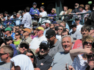 Jowl enjoying the sun in Section 114 as he tries to keep up with incoming text messages, Friday, 2010/04/09
