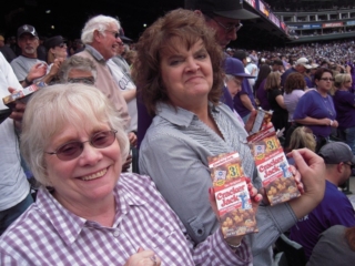 Rog comes through for Jan Fullerton and Margie Dudley et al (Herb and Pattie Brockman can be seen behind Roger Stone) with the usual 7th inning stretch treat as he has every year except 2003 and for that he is certainly excused, 2013/04/05