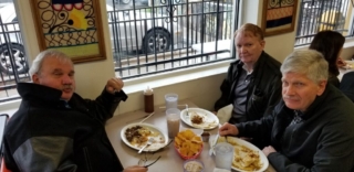 Tim, Rick, and Don fuel up for the big show.