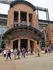 Fans scurry past "First Base".