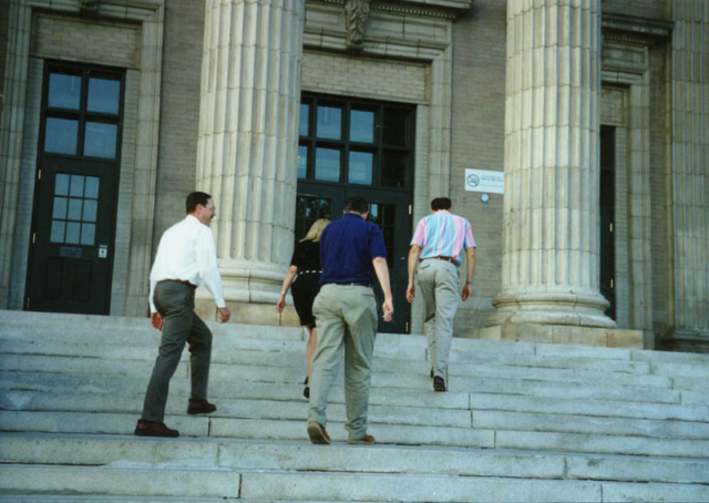 Joe Lee, Crete, Don and Dave climbing the front steps of Central HS