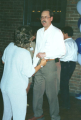 Judy (Chandler) Brockman coaxing Joseph Lee to dance at Pueblo Union Depot