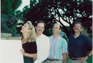 Same four, admiring the mascot